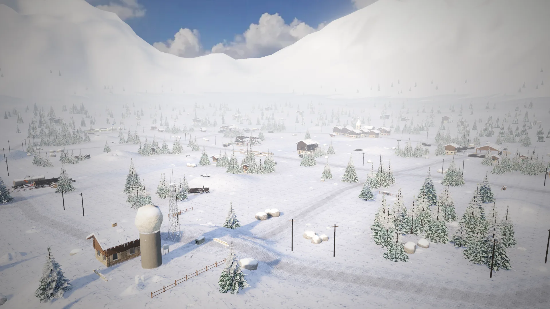 Snowline, alpine valley, frozen river and railway